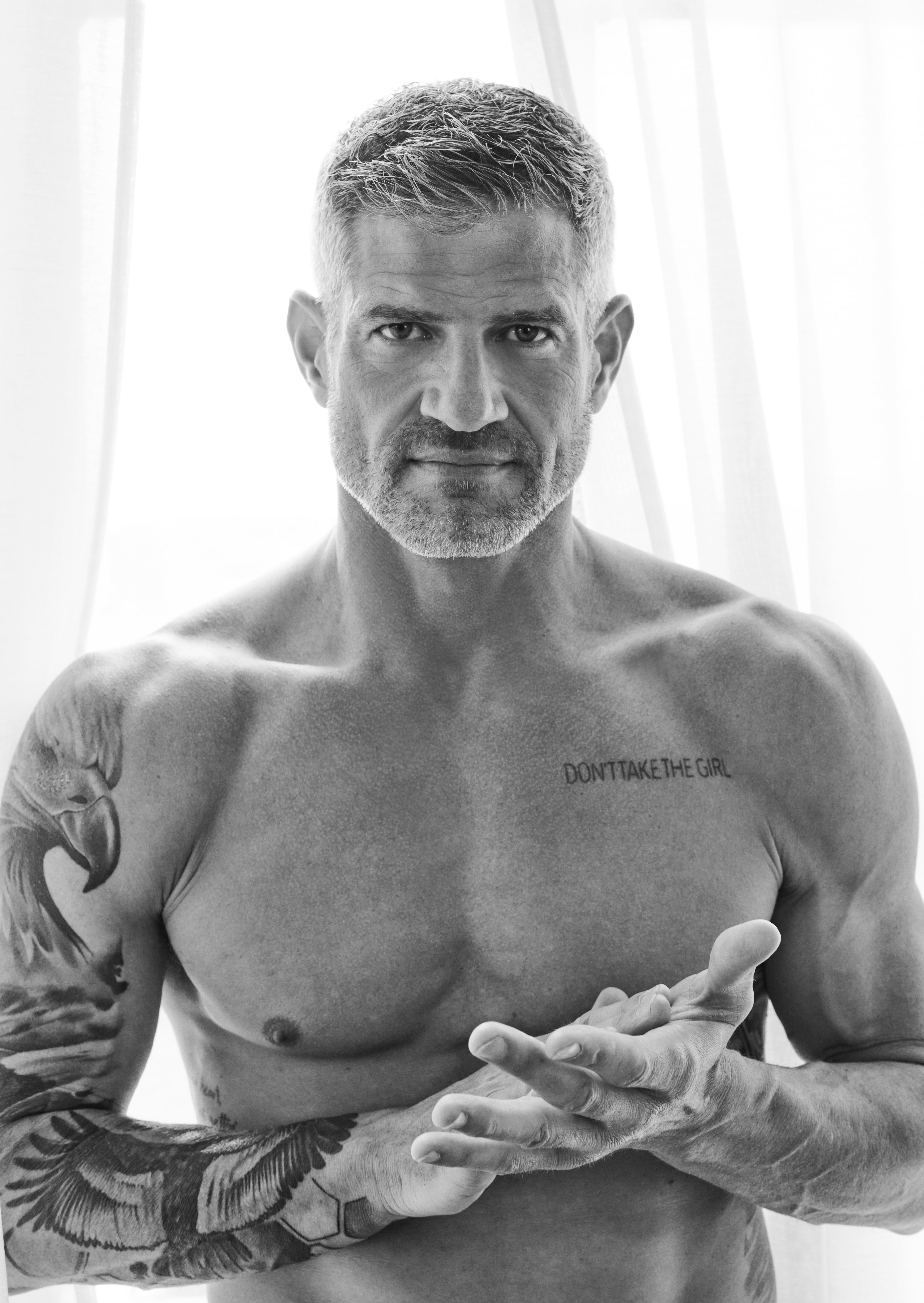 Black and white studio portrait of Brandon Burke