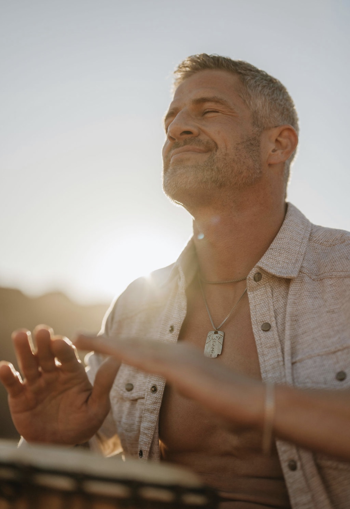 Brandon Burke outdoors in golden light